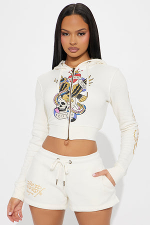 https://cdn.shopify.com/s/files/1/0293/9277/files/02-11-25_S7_50_EFNS18002_Ivory_KJ_AC_14-16-24_78337_WG_PXF.jpg?v=1739475957