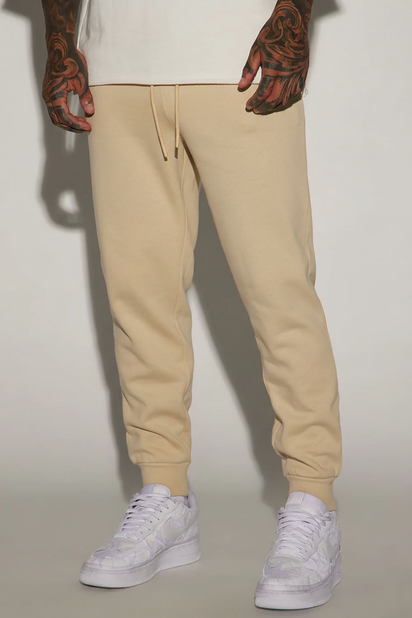 https://cdn.shopify.com/s/files/1/0293/9277/files/10-21-23Studio7_KJ_DJ_09-36-06_16_NMKB10218_Tan_P_57126_CM_KP.jpg?v=1763153323
