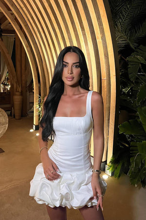 https://cdn.shopify.com/s/files/1/0293/9277/files/8-27-2024__097_Sienna_Satin_Bubble_Mini_Dress_White_GF.jpg?v=1747186322