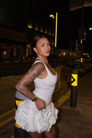 https://cdn.shopify.com/s/files/1/0293/9277/files/9-2-2024__179_Sienna_Satin_Bubble_Mini_Dress_White_LA.jpg?v=1747186322
